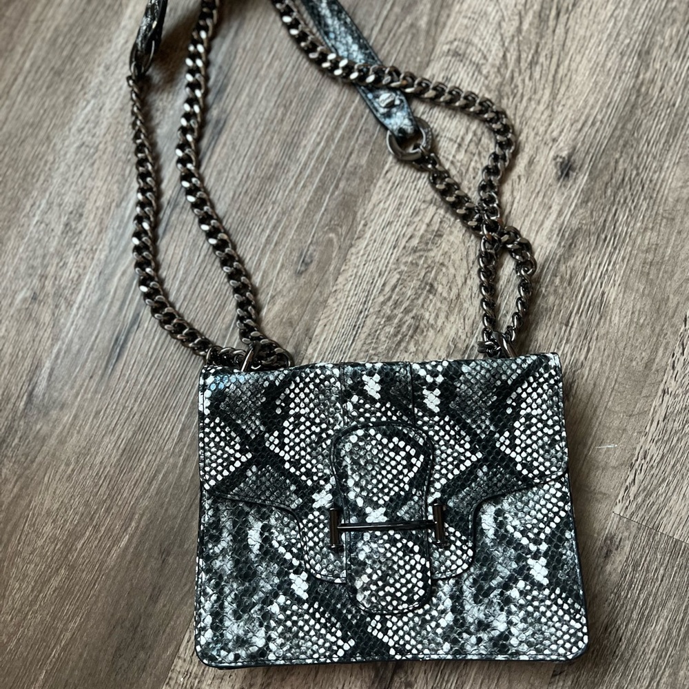 Circus chain strap crossbody bag